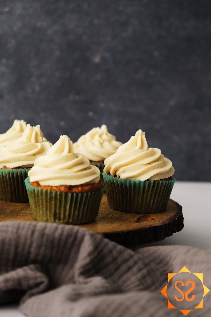 vegan cream cheese frosting on cupcakes vertical