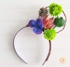 One wire ear on a headband with flowers