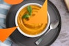 mashed-butternut-squash-in-bowl-with-sage-leaves-on-plate