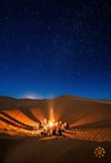 Campfire in the Sahara Desert at night