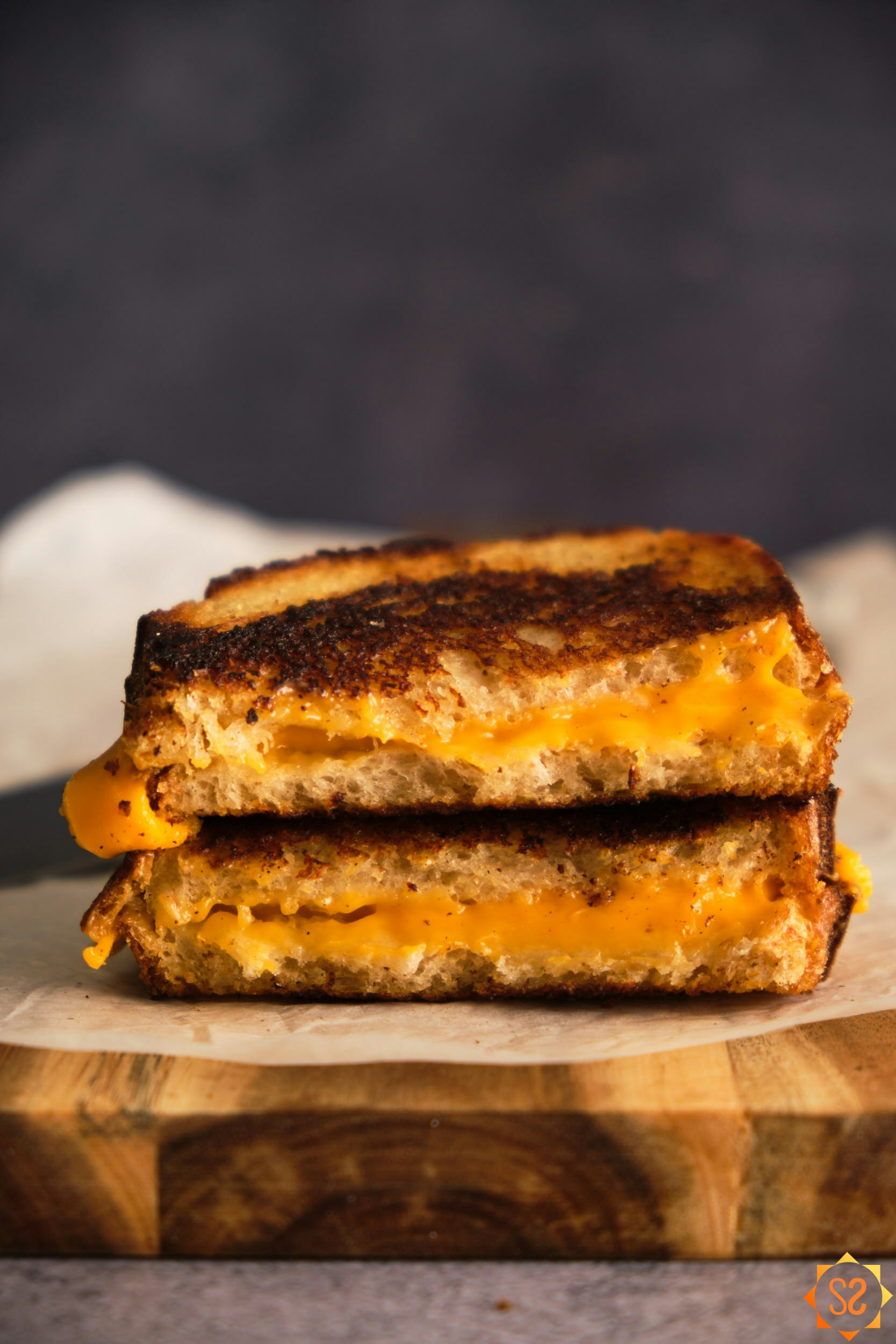 A side view of a grilled cheese sandwich made with 365 plant-based cheddar, stacked