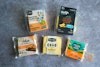 Packages of 365 Plant-Based Cheddar, Violife Mature Cheddar Slices, Daiya Cheddar Style Slices, Chao Creamy Original, and Follow Your Heart American
